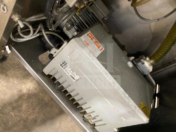 Multivac stainless steel chamber vacuum packing machine in good condition, showing model label and wiring details.