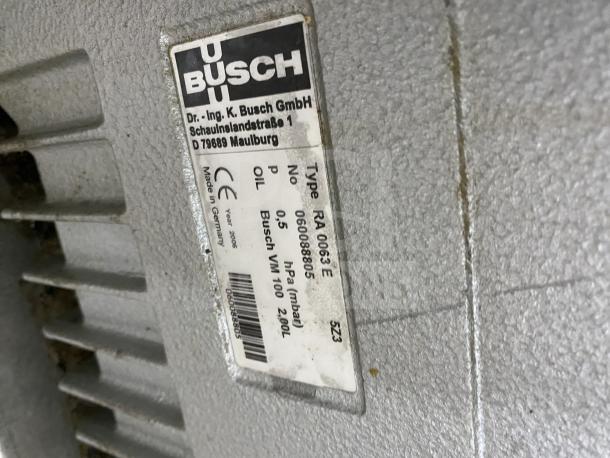 Busch vacuum pump label on Multivac vacuum packing machine, model RA 0063 E, 0.5 hPa, Made in Germany.