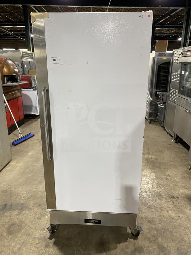 Arctic Air F22CW7 freezer, stainless steel, reach-in, electric, 115V, white body, on casters, includes rack, SN: WB91910324.