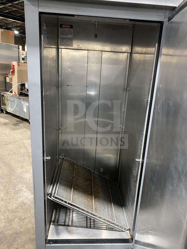 Economy single-door stainless steel refrigerator, Model ER1A-FS, Energy Star certified, with poly-coated wired rack.