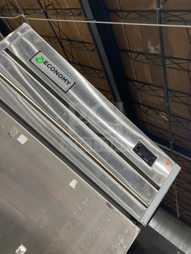 Economy ER1AFS stainless steel reach-in refrigerator, Energy Star certified, with poly-coated wired rack and casters.