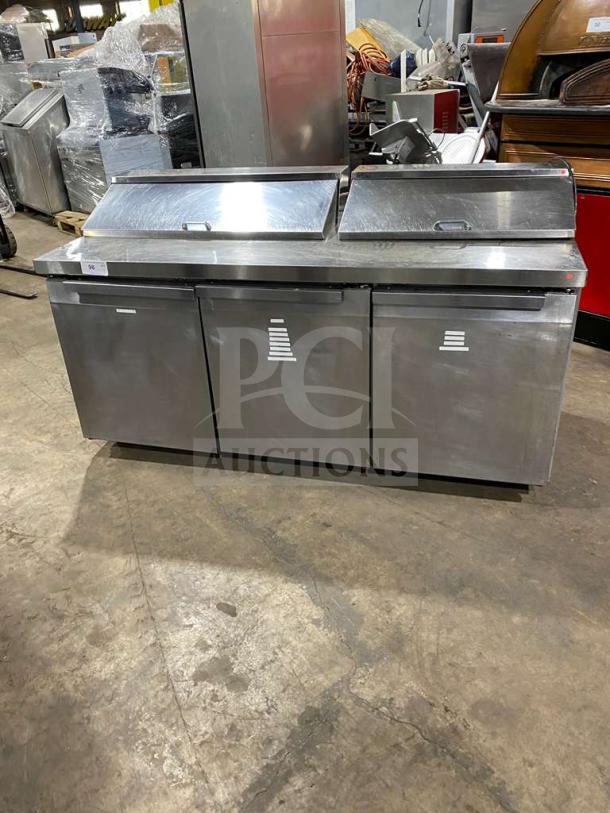 Continental SW72-18 refrigerated prep table, stainless steel, 3-door, 72", with poly coated rack, on casters, model SN: 151B4155.