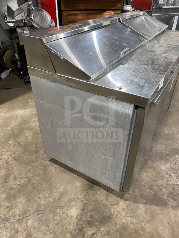 Continental SW72-18 3-door stainless steel refrigerated prep table, poly-coated wire rack, on casters, Model: SW72-18.