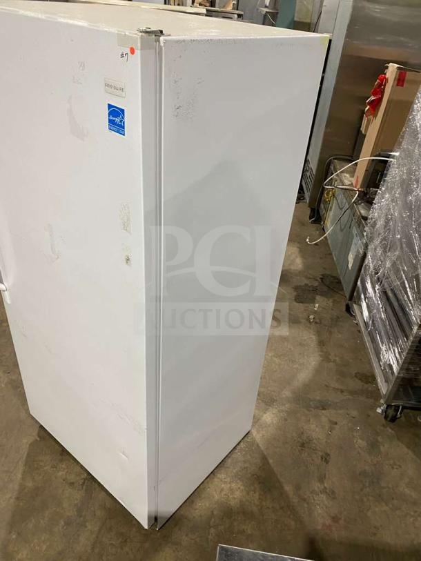 Frigidaire FFUH21F2NWA single door freezer, white, Energy Star, poly coated wired rack, commercial use, good condition.