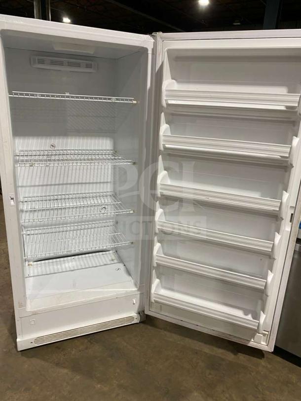 Frigidaire Commercial white single door reach-in freezer, model FFUH21F2NWA, Energy Star certified, with poly-coated wired racks.