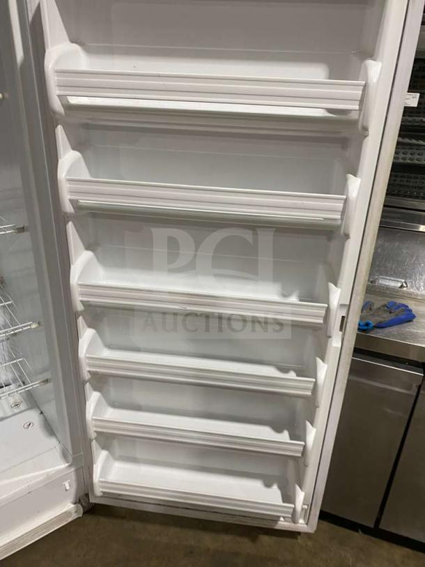 Frigidaire Commercial white single door freezer, model FFUH21F2NWA, with Energy Star certification and poly-coated wire rack.