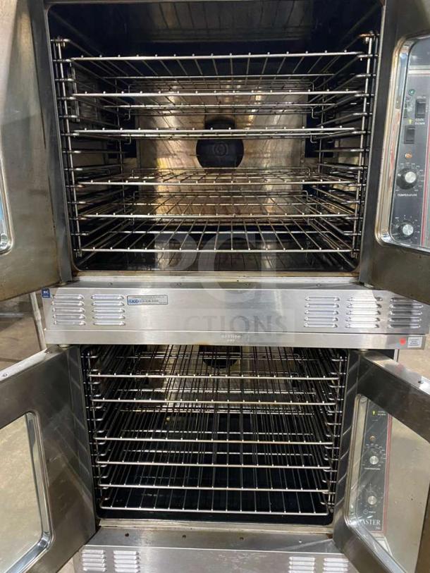 Garland stainless steel double convection oven, gas-powered, thermostatic controls, includes wired racks, on casters.