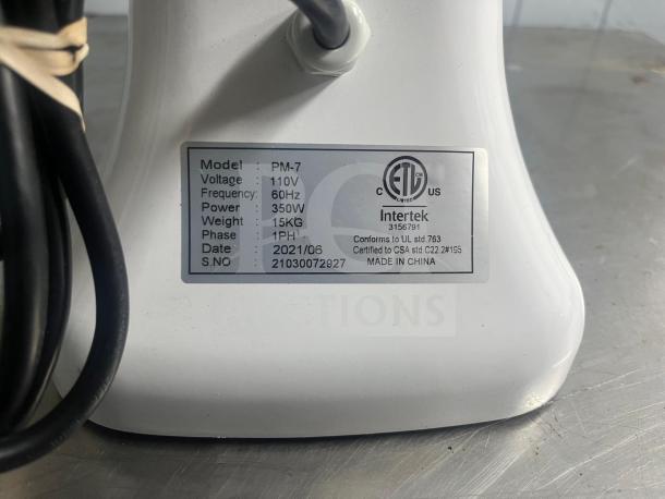Primo PM-7 commercial planetary mixer, 7-quart, 350W, 110V. Model PM-7, tag details: 15kg, made in China.