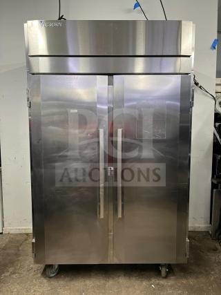VICTORY ULTRASPEC roll-thru refrigerator, stainless steel, solid doors, front and rear access, on casters, excellent condition.
