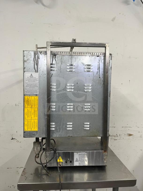Inoksan PDG 400N doner kebab machine, stainless steel, natural gas, field convertible, 132-165 lb. capacity, visible safety labels.