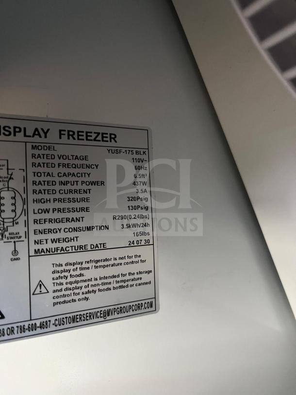 YUKON USF-175BLK glass door freezer label shows model, voltage, capacity, refrigerant type, energy use, and weight.