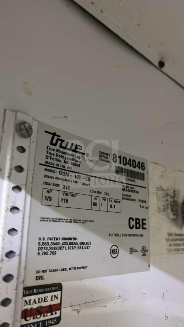 TRUE GDM-19T-LD 27" black refrigerated glass door merchandiser, LED lighting, model label with specs. Comes with travel case.