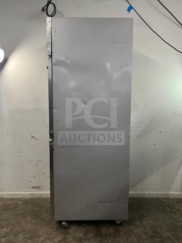 ATOSA MSF8307GR 60" double door prep table, visible wear, on casters, suitable for sandwich/salad prep.