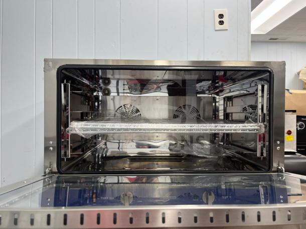 ROCKET ENCOV-38 countertop convection oven, full size, glass door, 208/204V; new condition with protective wrap inside.