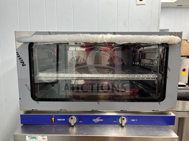 ROCKET ENCOV-38 countertop convection oven, full size, glass door, 208/240V, pristine condition, protective coverings visible.