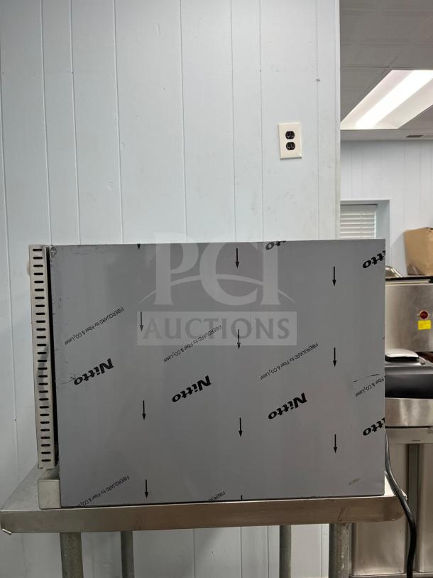 ROCKET ENCOV-38 countertop convection oven, full size, glass door, new condition, 208/204V, side view on a stand.