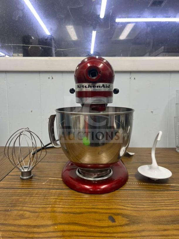 KitchenAid Artisan 5 Quart Stand Mixer, model KSM150PS, in Empire Red. Includes whisk and dough hook. Good condition.