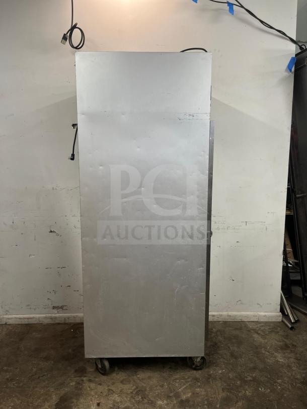 Traulsen G10010 30" G Series solid door refrigerator, right hinged, on caster wheels, used condition.