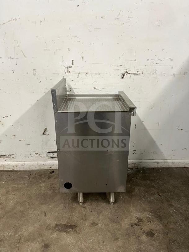 Perlick SC24-18 24" stainless steel storage cabinet with open base, sturdy construction, visible wear, no shelves included.