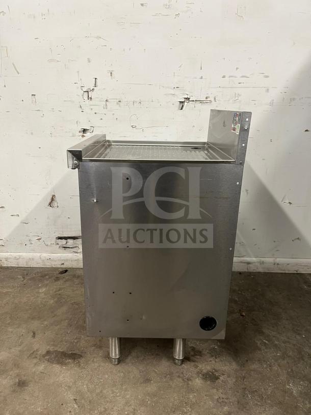 Perlick SC24-18 24" stainless steel storage cabinet with open base, visible shelf supports, and sturdy legs. Great condition.