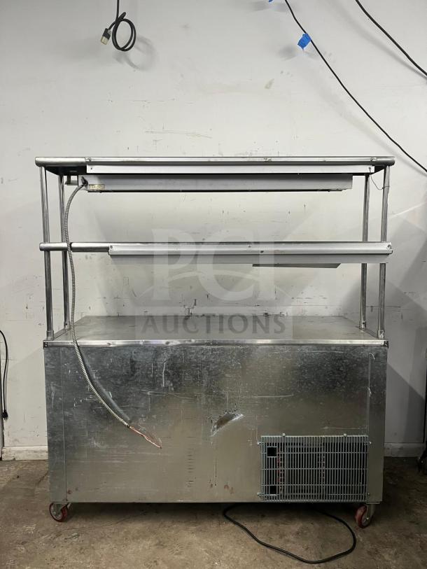 Leader LB48 under counter refrigerator, 48", with 2 full and 1/2 door, double shelves, heat lamp, visible wear.