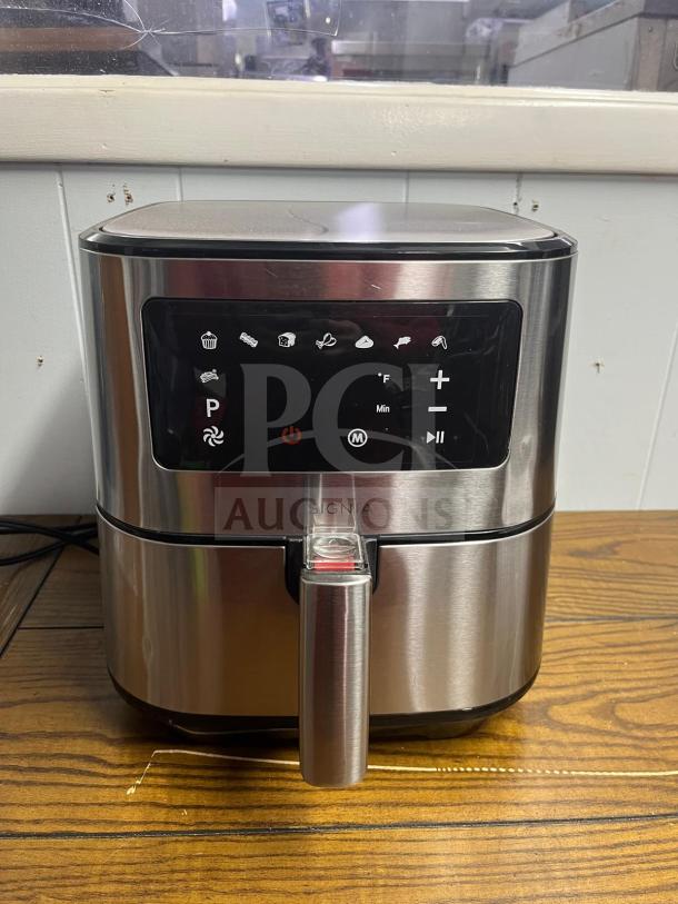 Insignia™ 5 Qt. Digital Air Fryer in stainless steel with touch controls; good condition, model name visible on front.