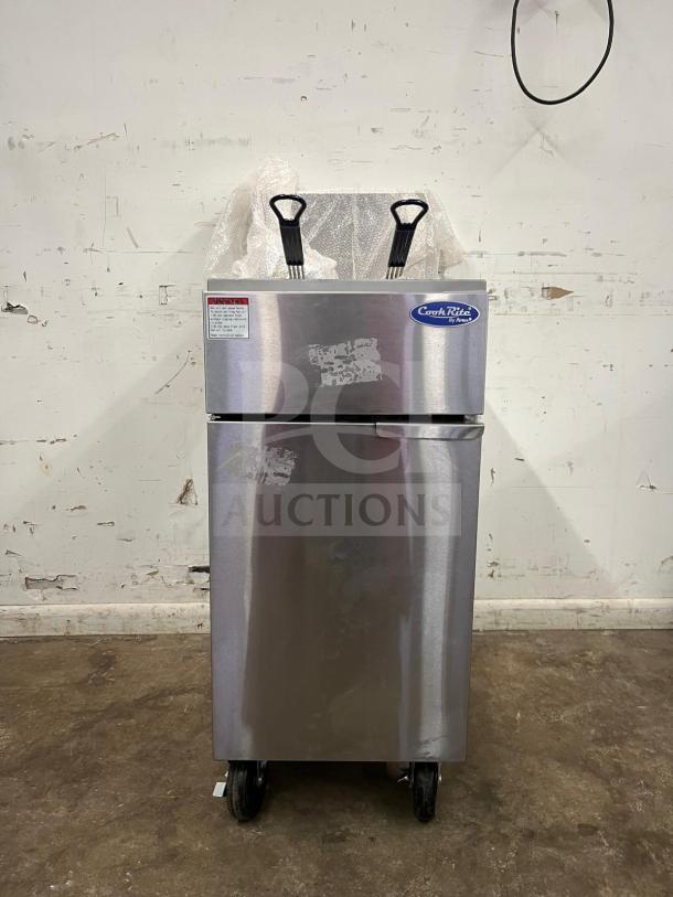 Brand new Atosa CookRite ATFS-50 gas fryer, 50 lb capacity, stainless steel, four burners, casters, labeled "CookRite".