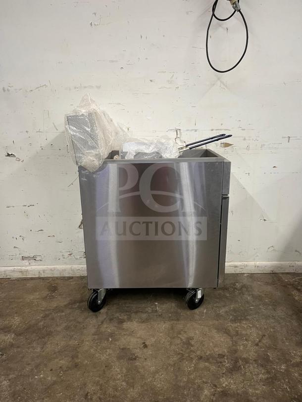 BRAND NEW Atosa ATFS-50 CookRite 50 lb gas fryer with 4 burners. Stainless steel, heavy-duty, on casters, wrapped in packaging.