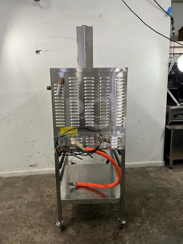 SOLARIS SX-5GR natural gas convection steamer, stainless steel, approx. 42,000-47,000 BTU, includes cooling racks, fair condition.