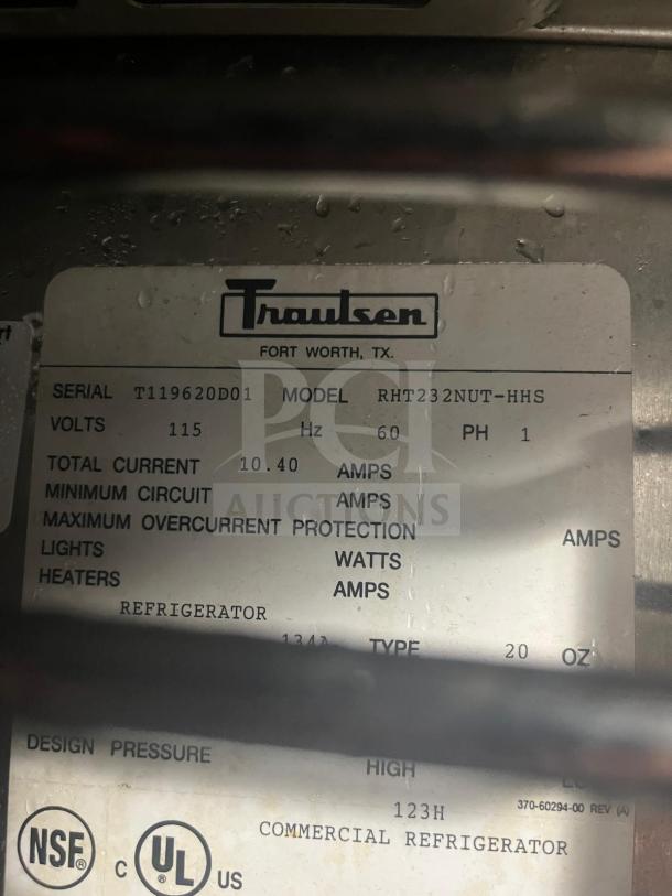 TRAULSEN RHT232NUT-HHS stainless steel refrigerator label, showing model, serial number, and electrical specifications.