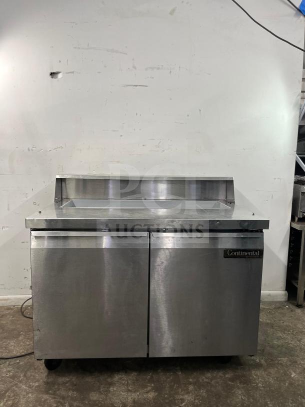 Continental SW48-12 refrigerated sandwich prep unit, 48", 13.4 cu ft, stainless steel, dual doors, used condition.