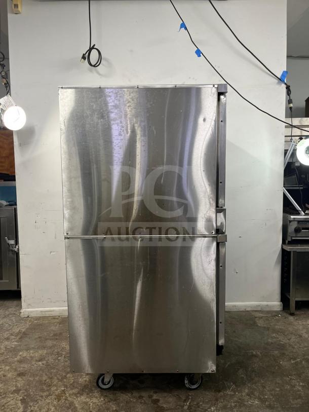 Imperial Double-Deck Convection Oven, Model DOUBLE STACK, stainless steel, on casters, some surface wear visible.