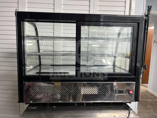 Yukon SWEET RTW-160 Refrigerated Display Case, curved glass, countertop model, digital controls, excellent condition.
