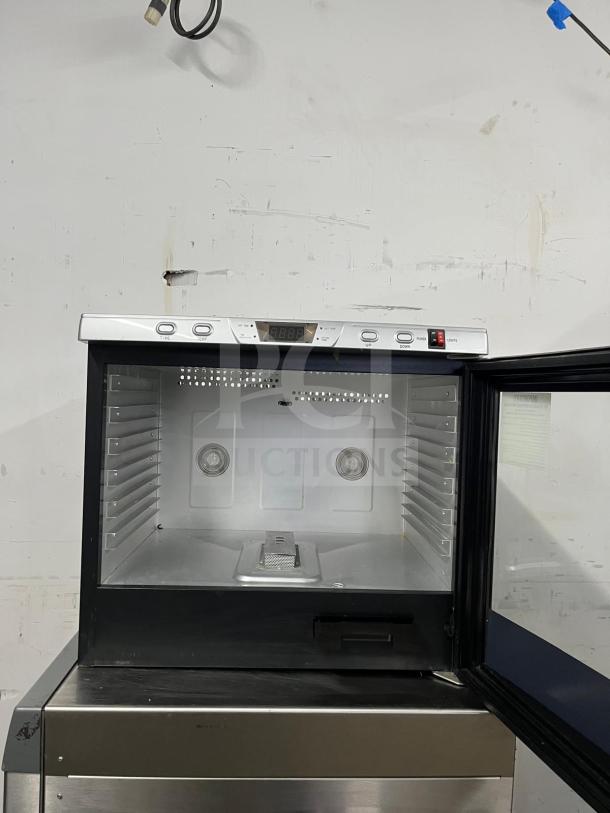 BRAND NEW Weston Pro-1200 12-tray digital dehydrator (80L) with LED display and stainless steel interior. Condition: Pristine.