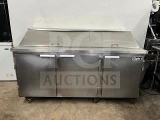 LEADER NSFM72 72" 3-door refrigerated prep table, stainless steel, good condition, visible branded label.
