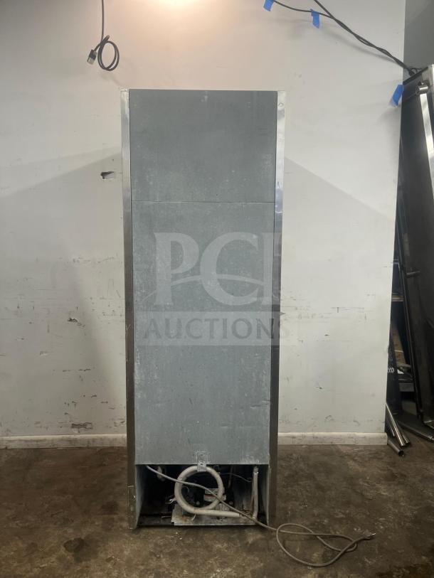 Turbo Air TSF-23SD-N reach-in freezer, solid door, stainless steel, visible cords, rear view, used condition.