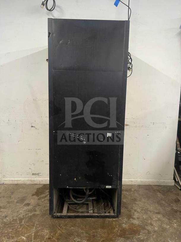 True GDM-26 merchandiser refrigerator, black exterior, one swing glass door, visible wear, missing lower front panel.