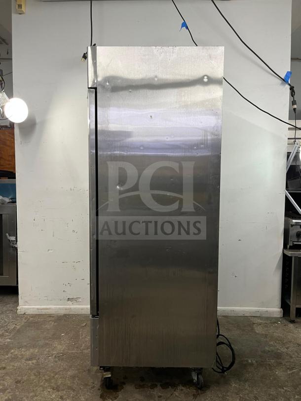 ATOSA MBF8505GR stainless steel reach-in refrigerator, 27-inch, 19.1 cu ft, Energy Star certified, visible wear, on casters.