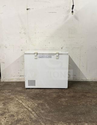 Magic Chef Deep Freezer, model Deep Freezer, white, with two metal latches and visible label on front. Good condition.