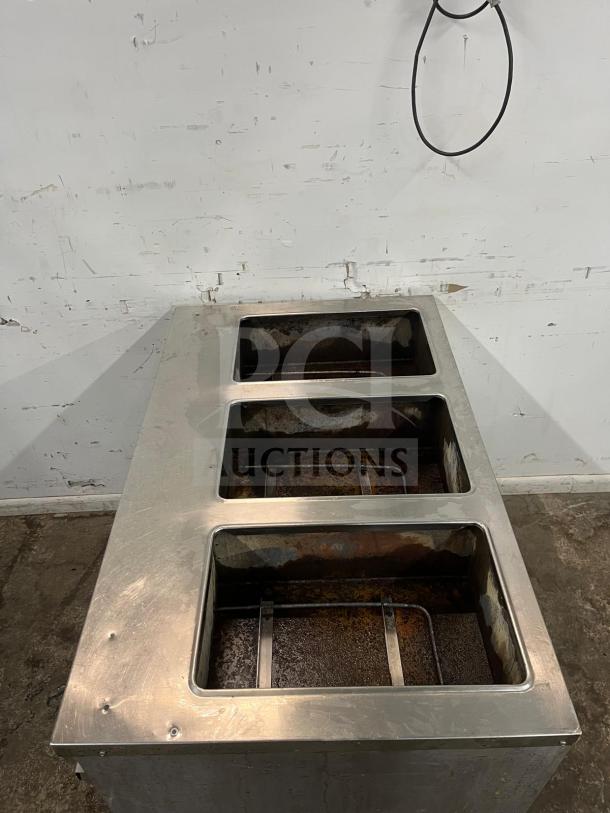 RANDELL 3513-120 48" electric hot food table with three top openings, industrial metal finish, used condition.