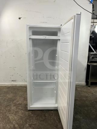 Insignia 7 Cu. Ft. Upright Convertible Freezer, model NS-UZ70WH4. White, open door view, versatile freezer-fridge. Excellent condition.