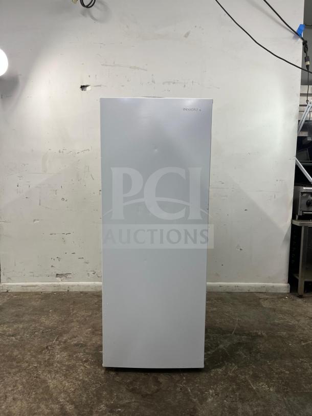 Insignia™ 7 Cu. Ft. Upright Convertible Freezer, model NS-UZ70WH4, versatile and energy-efficient, white finish.

