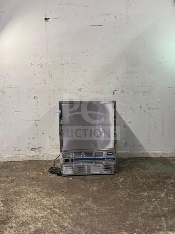 Follett Performance Plus under counter refrigerator, model REV 4-ADA, right hinge, stainless steel, minor dents visible.