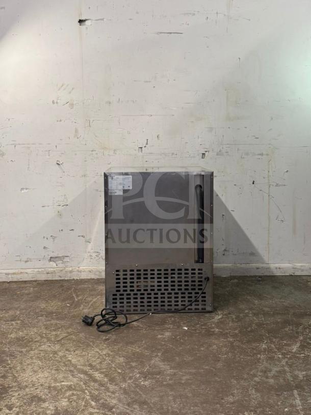 Follett Performance Plus undercounter refrigerator, model REV 4-ADA, right hinge, stainless steel, visible power cord and label.