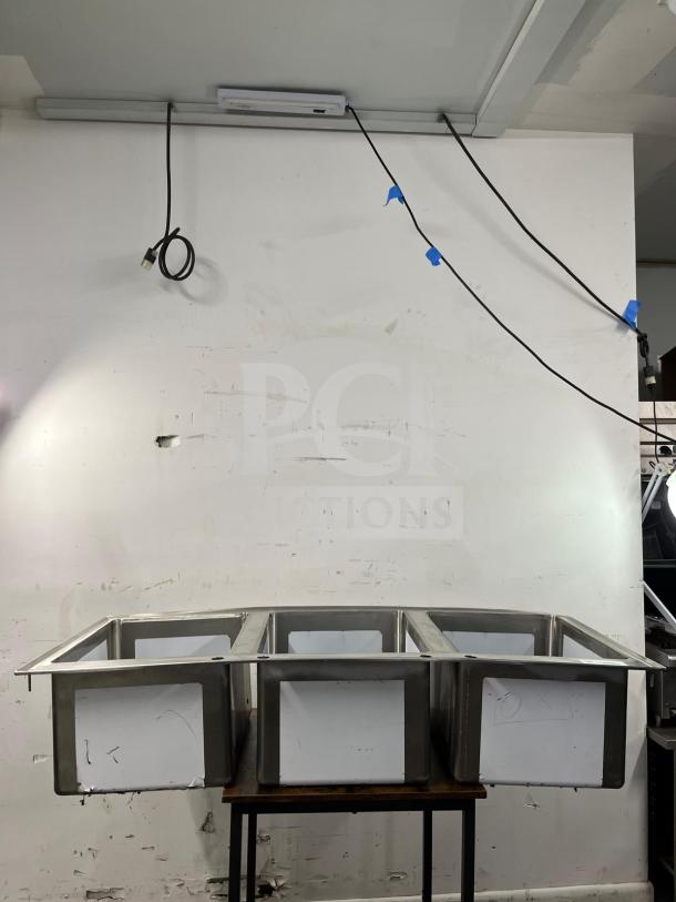 BRAND NEW Regency 16-gauge stainless steel three-compartment drop-in sink, model 600DI31612.