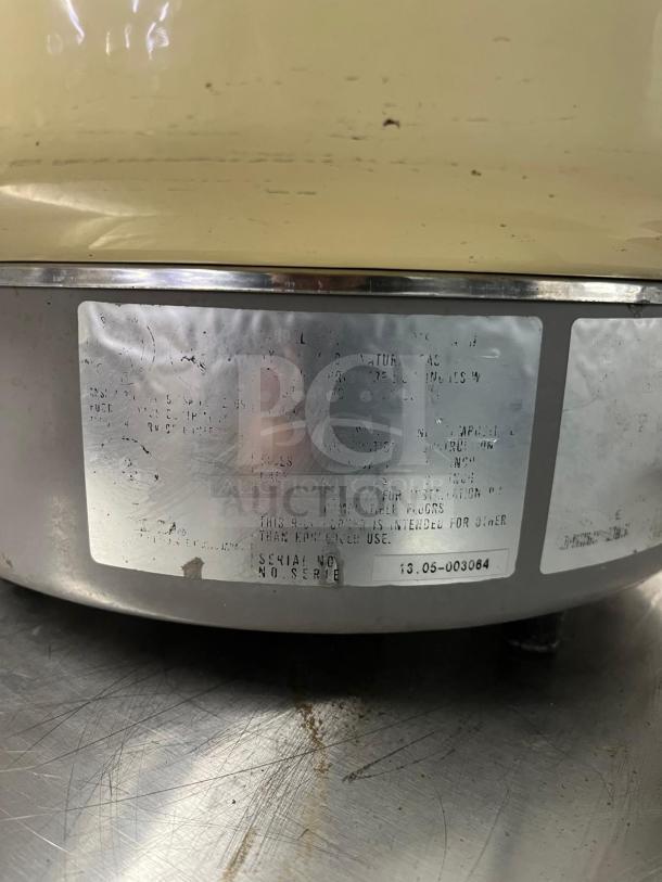 Rinnai RER55ASN 55 Cup Commercial Natural Gas Rice Cooker with visible nameplate detailing specifications and serial number.