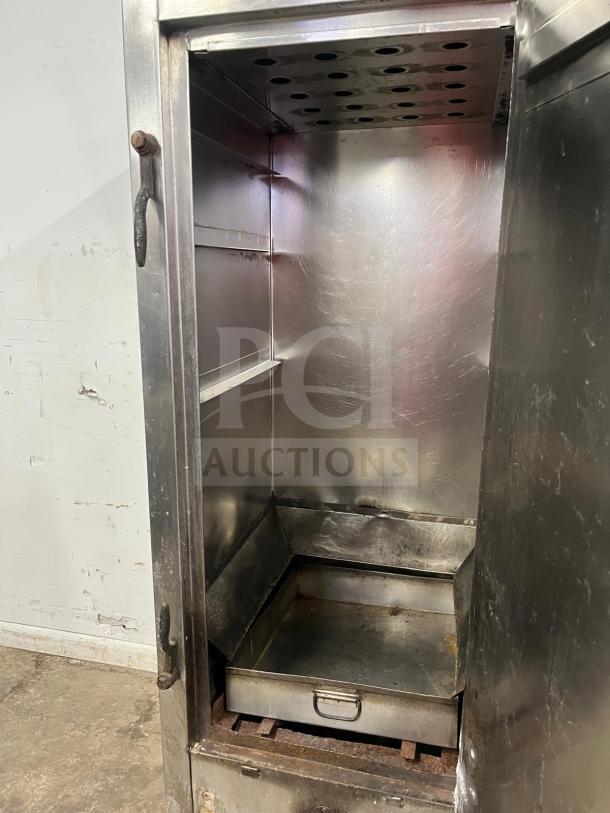 UNIVERSAL smoker oven, galvanized interior, 3 burners, 78", open door view. Good condition, sturdy build, industrial use.