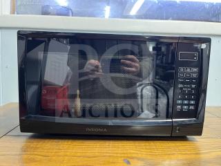 Insignia NS-MW07BKO 0.7 Cu. Ft. compact countertop microwave in black, featuring digital controls and LED display.