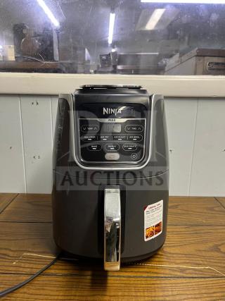 Ninja AF161 Air Fryer Max XL in good condition, featuring digital controls, and multiple cooking functions.
