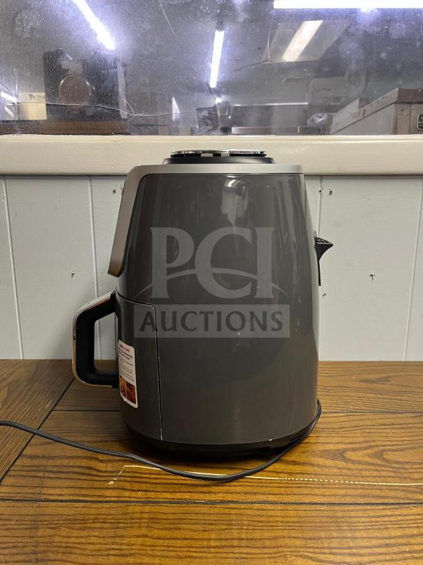 Ninja AF161 Air Fryer Max XL, black, with a side handle and control knobs on top. Used condition.